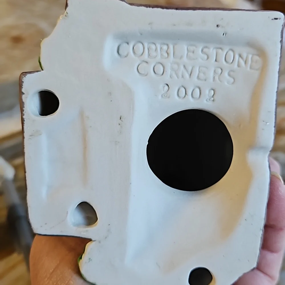 cobblestone corners porcelain house